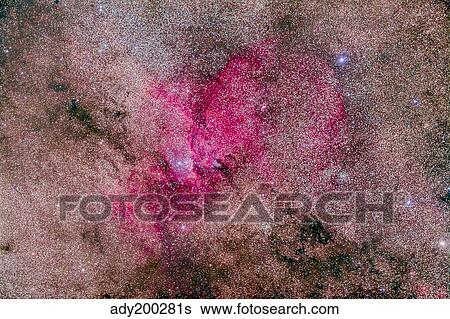 Stock Photograph - NGC 6193 nebulosity in Ara with several open clusters.. Fotosearch