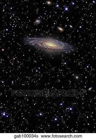 Stock Photograph - NGC 7331 is a spiral galaxy in the constellation Pegasus.. Fotosearch