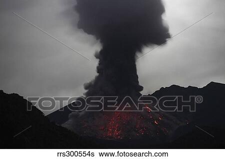 Stock Photograph - Night time explosive eruption of Sakurajima volcano, Japan.. Fotosearch