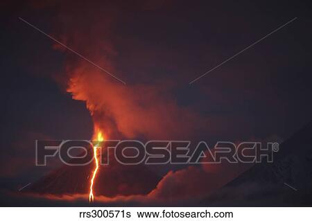 Stock Photograph - Nighttime eruption of Kliuchevskoi Volcano, Russia.. Fotosearch