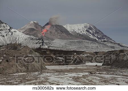 Nighttime view of glowing lava down flank of Shiveluch Volcano. View Large Photo Image Stock Photograph - Nighttime view of glowing lava down flank of Shiveluch Volcano.. Fotosearch