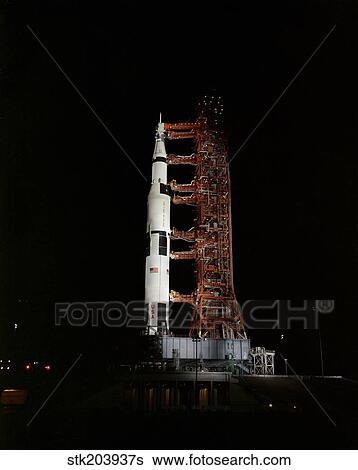 Nighttime view of the Apollo 13 space vehicle. View Large Photo Image Stock Photograph - Nighttime view of the Apollo 13 space vehicle.. Fotosearch