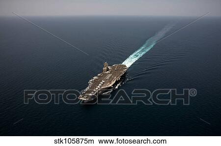Picture - Nimitz class aircraft carrier USS Abraham Lincoln transits the Arabian Sea.. Fotosearch