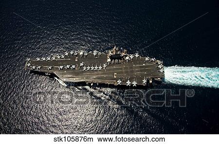 Nimitz class aircraft carrier USS Abraham Lincoln transits the Arabian Sea. View Large Photo Image Picture - Nimitz class aircraft carrier USS Abraham Lincoln transits the Arabian Sea.. Fotosearch