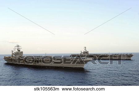 Nimitz-class aircraft carriers transit the Arabian Sea. View Large Photo Image Picture - Nimitz-class aircraft carriers transit the Arabian Sea.. Fotosearch