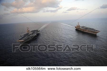 Nimitz-class aircraft carriers transit the Arabian Sea. View Large Photo Image Picture - Nimitz-class aircraft carriers transit the Arabian Sea.. Fotosearch