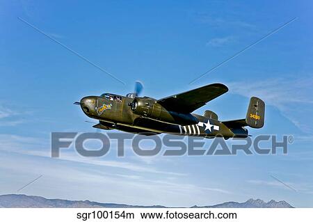 North American B-25G Mitchell bomber in flight near Mesa, Arizona. View Large Photo Image Picture - North American B-25G Mitchell bomber in flight near Mesa, Arizona.. Fotosearch