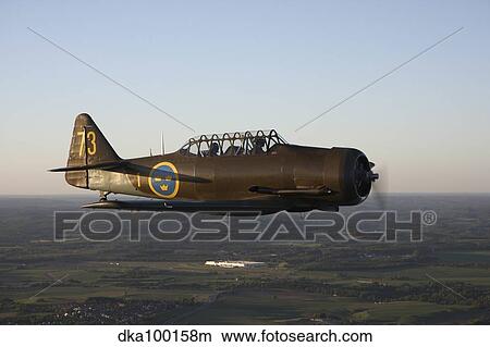 North American T-6 Texan trainer warbird in Swedish Air Force colors. View Large Photo Image Picture - North American T-6 Texan trainer warbird in Swedish Air Force colors.. Fotosearch