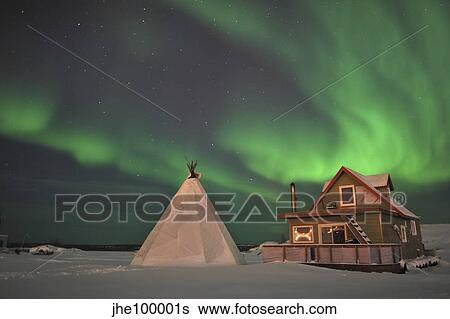 Northern Lights above village, Northwest Territories, Canada. View Large Photo Image Stock Photograph - Northern Lights above village, Northwest Territories, Canada.. Fotosearch