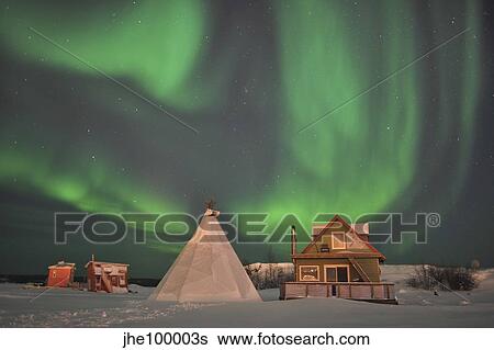 Northern Lights above village, Northwest Territories, Canada. View Large Photo Image Stock Photograph - Northern Lights above village, Northwest Territories, Canada.. Fotosearch