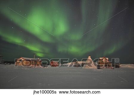 Northern Lights above village, Northwest Territories, Canada. View Large Photo Image Stock Photograph - Northern Lights above village, Northwest Territories, Canada.. Fotosearch