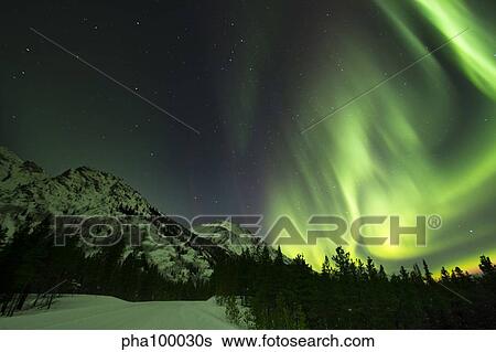 Northern lights over Annie Lake Road, Yukon, Canada. View Large Photo Image Stock Photograph - Northern lights over Annie Lake Road, Yukon, Canada.. Fotosearch