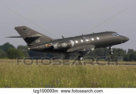 Norwegian Falcon 20 aircraft taking off from Germany. View Large Photo Image Picture - Norwegian Falcon 20 aircraft taking off from Germany.. Fotosearch