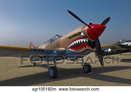 Nose art on a Curtiss P-40E Warhawk. View Large Photo Image Picture - Nose art on a Curtiss P-40E Warhawk.. Fotosearch
