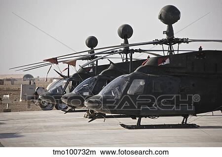 OH-58D Kiowa helicopters on the flight line at COB Speicher, Iraq. View Large Photo Image Picture - OH-58D Kiowa helicopters on the flight line at COB Speicher, Iraq.. Fotosearch