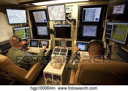 Picture - Operators control UAV's from a ground control station.. Fotosearch