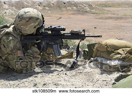 Oregon Army National Guard fires an M4 rifle. View Large Photo Image Picture - Oregon Army National Guard fires an M4 rifle.. Fotosearch