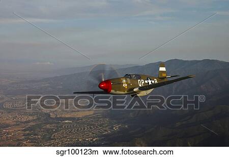 P-51B Mustang in flight over China, California. View Large Photo Image Picture - P-51B Mustang in flight over China, California.. Fotosearch