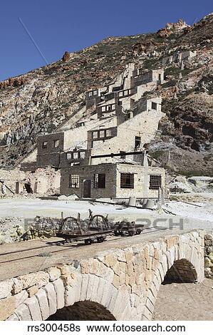 Stock Photograph - Paliorema sulfur mine and processing facility, Milos Island, Greece.. Fotosearch