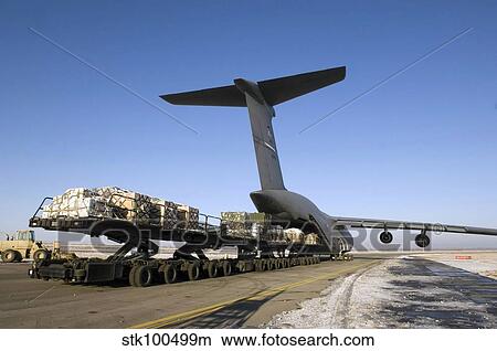 Pallets await loading onto a C-5 Galaxy. View Large Photo Image Picture - Pallets await loading onto a C-5 Galaxy.. Fotosearch