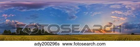 Stock Photograph - Panorama of a colorful sunset over a prairie in Alberta, Canada.. Fotosearch