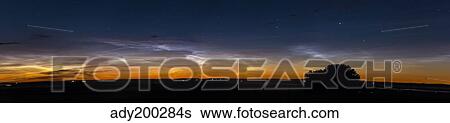 Panorama of noctilucent clouds in Alberta, Canada. View Large Photo Image Stock Photograph - Panorama of noctilucent clouds in Alberta, Canada.. Fotosearch