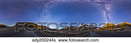 Stock Photograph - Panorama of the Columbia Icefields and Athabasca Glacier at moonrise. . Fotosearch