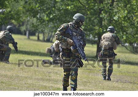 Pathfinders of the Belgian army proceeding in the fields. View Large Photo Image Picture - Pathfinders of the Belgian army proceeding in the fields.. Fotosearch