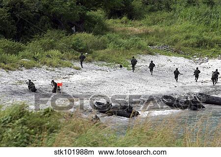 Philippine Marines assault a beach. View Large Photo Image Picture - Philippine Marines assault a beach.. Fotosearch