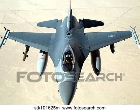 Pilot gives a thumbs up after successfully refueling his F-16 Fighting Falcon. View Large Photo Image Picture - Pilot gives a thumbs up after successfully refueling his F-16 Fighting Falcon.. Fotosearch
