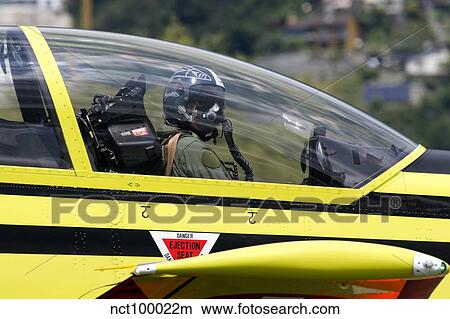 Picture - Pilot in the cockpit of a Pilatus PC-9 of the Swiss Air Force.. Fotosearch