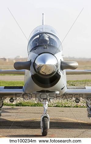 Pilots perform a pre-flight on their T-6 Texan trainer aircraft. View Large Photo Image Picture - Pilots perform a pre-flight on their T-6 Texan trainer aircraft.. Fotosearch