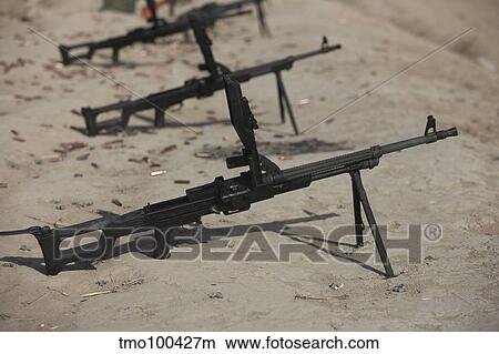PK general-purpose machine guns stand ready on a firing range. View Large Photo Image Picture - PK general-purpose machine guns stand ready on a firing range.. Fotosearch