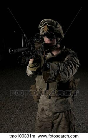 Portrait of a U. S. Marine wearing night vision device. View Large Photo Image Picture - Portrait of a U. S. Marine wearing night vision device.. Fotosearch