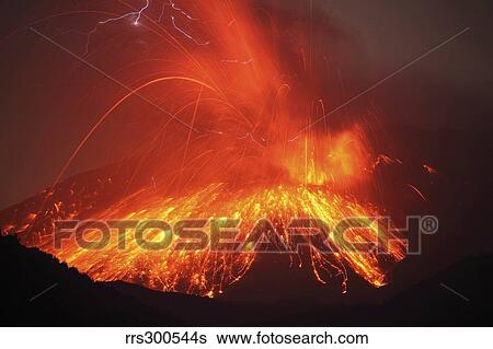 Stock Photograph - Powerful night time explosive eruption of Sakurajima volcano, Japan.. Fotosearch