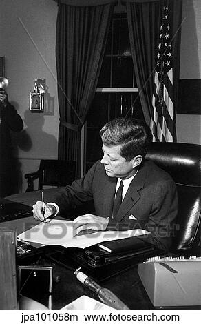 President John F. Kennedy signing the Cuba Quarantine Proclamation. View Large Photo Image Picture - President John F. Kennedy signing the Cuba Quarantine Proclamation.. Fotosearch