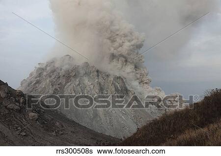 Pyroclastic flow descending flank of Rerombola lava dome of Paluweh volcano. View Large Photo Image Stock Photograph - Pyroclastic flow descending flank of Rerombola lava dome of Paluweh volcano.. Fotosearch