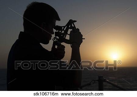 Quartermaster uses a statometer aboard USS Mobile Bay. View Large Photo Image Picture - Quartermaster uses a statometer aboard USS Mobile Bay.. Fotosearch