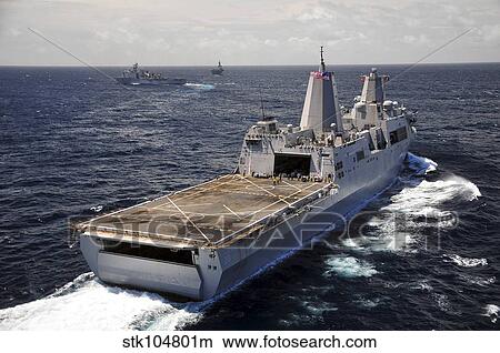 Rear view of USS Green Bay with a convoy of ships in the Indian Ocean. View Large Photo Image Picture - Rear view of USS Green Bay with a convoy of ships in the Indian Ocean.. Fotosearch