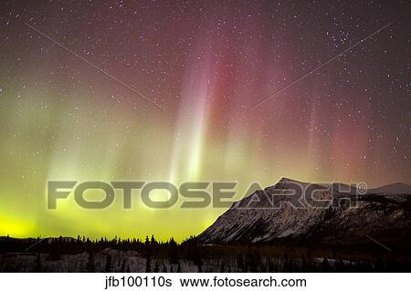 Red aurora borealis over Carcross Desert, Canada. View Large Photo Image Stock Photograph - Red aurora borealis over Carcross Desert, Canada.. Fotosearch