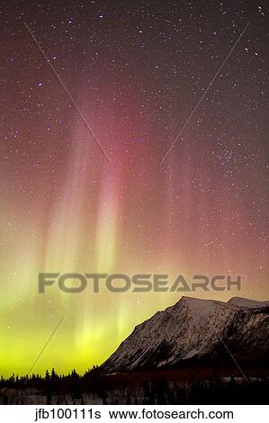 Red aurora borealis over Carcross Desert, Canada. View Large Photo Image Stock Photograph - Red aurora borealis over Carcross Desert, Canada.. Fotosearch
