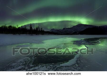 Reflected aurora over a frozen Laksa Lake, Nordland, Norway. View Large Photo Image Stock Photograph - Reflected aurora over a frozen Laksa Lake, Nordland, Norway.. Fotosearch