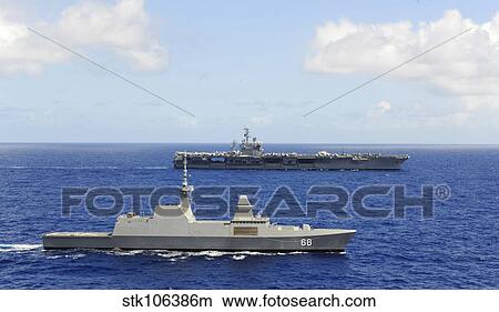 Republic of Singapore frigate RSS Formidable alongside USS Nimitz. View Large Photo Image Picture - Republic of Singapore frigate RSS Formidable alongside USS Nimitz.. Fotosearch