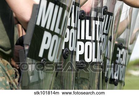 Riot control formation. View Large Photo Image Picture - Riot control formation.. Fotosearch
