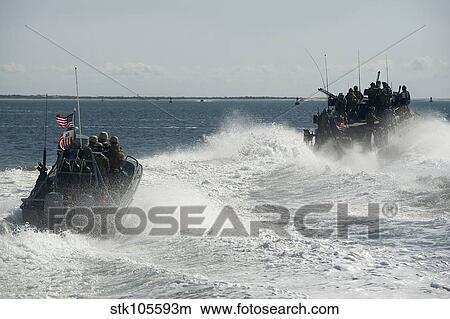 Picture - Riverine Command Boats and security boats practice maneuvers.. Fotosearch