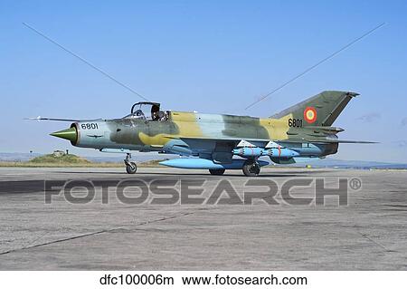 Romanian Air Force MiG-21 Lancer on the ramp at Camp Turzii. View Large Photo Image Picture - Romanian Air Force MiG-21 Lancer on the ramp at Camp Turzii.. Fotosearch