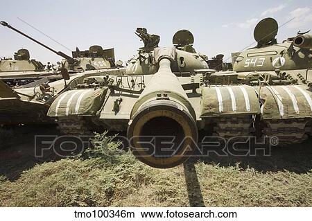 Russian T-54 and T-55 main battle tanks rest in an armor junkyard View Large Photo Image Picture - Russian T-54 and T-55 main battle tanks rest in an armor junkyard. Fotosearch
