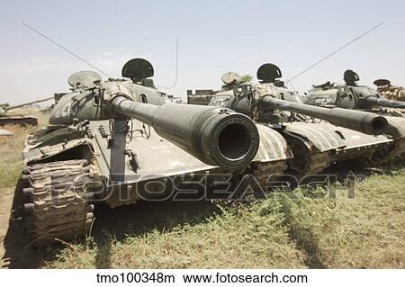 Russian T-54 and T-55 main battle tanks rest in an armor junkyard View Large Photo Image Picture - Russian T-54 and T-55 main battle tanks rest in an armor junkyard. Fotosearch