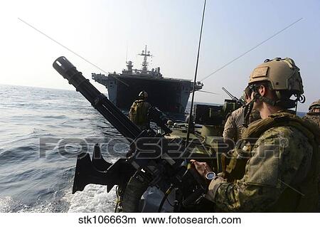 Sailors conduct patrol operations using a riverine command boat. View Large Photo Image Picture - Sailors conduct patrol operations using a riverine command boat.. Fotosearch
