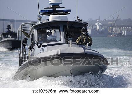 Sailors conduct training in small boat defensive tactics in San Diego Bay. View Large Photo Image Picture - Sailors conduct training in small boat defensive tactics in San Diego Bay.. Fotosearch
